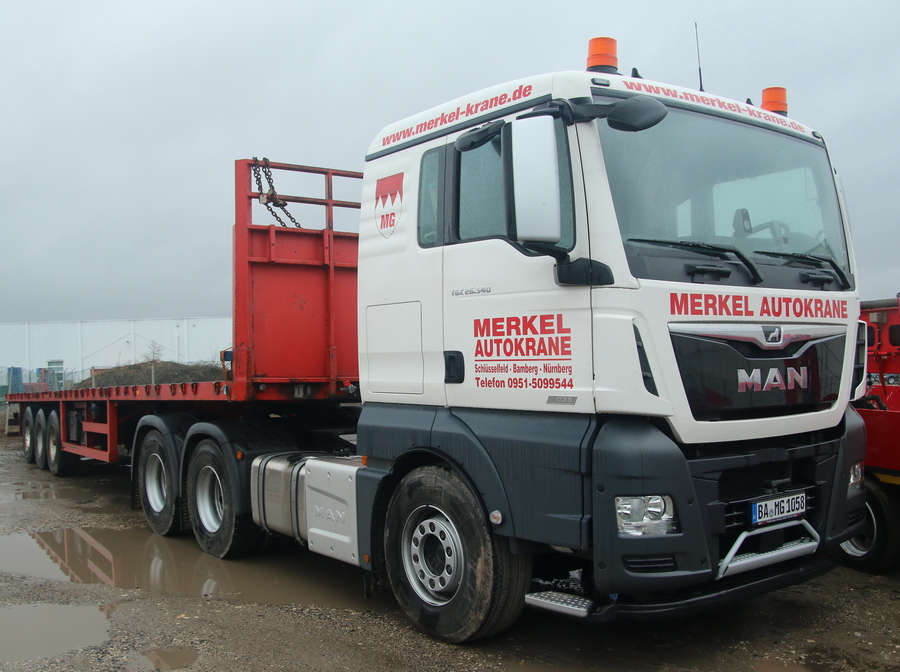 Merkel MAN TGX 26.540 mit Pritschenauflieger - Copyright: www.olli80.de