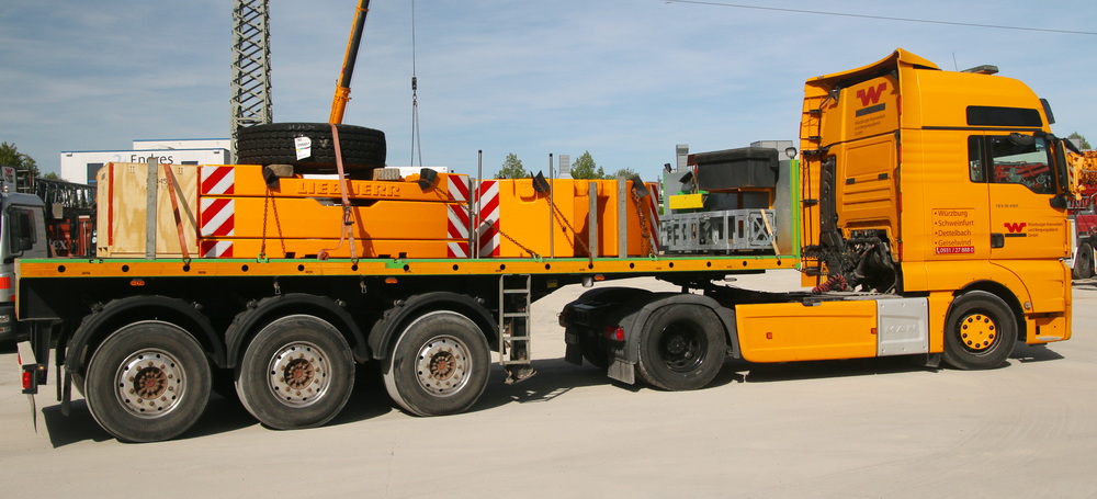 MAN TGX mit Pritschenauflieger Würzburger Kranverleih - Copyright: www.olli80.de